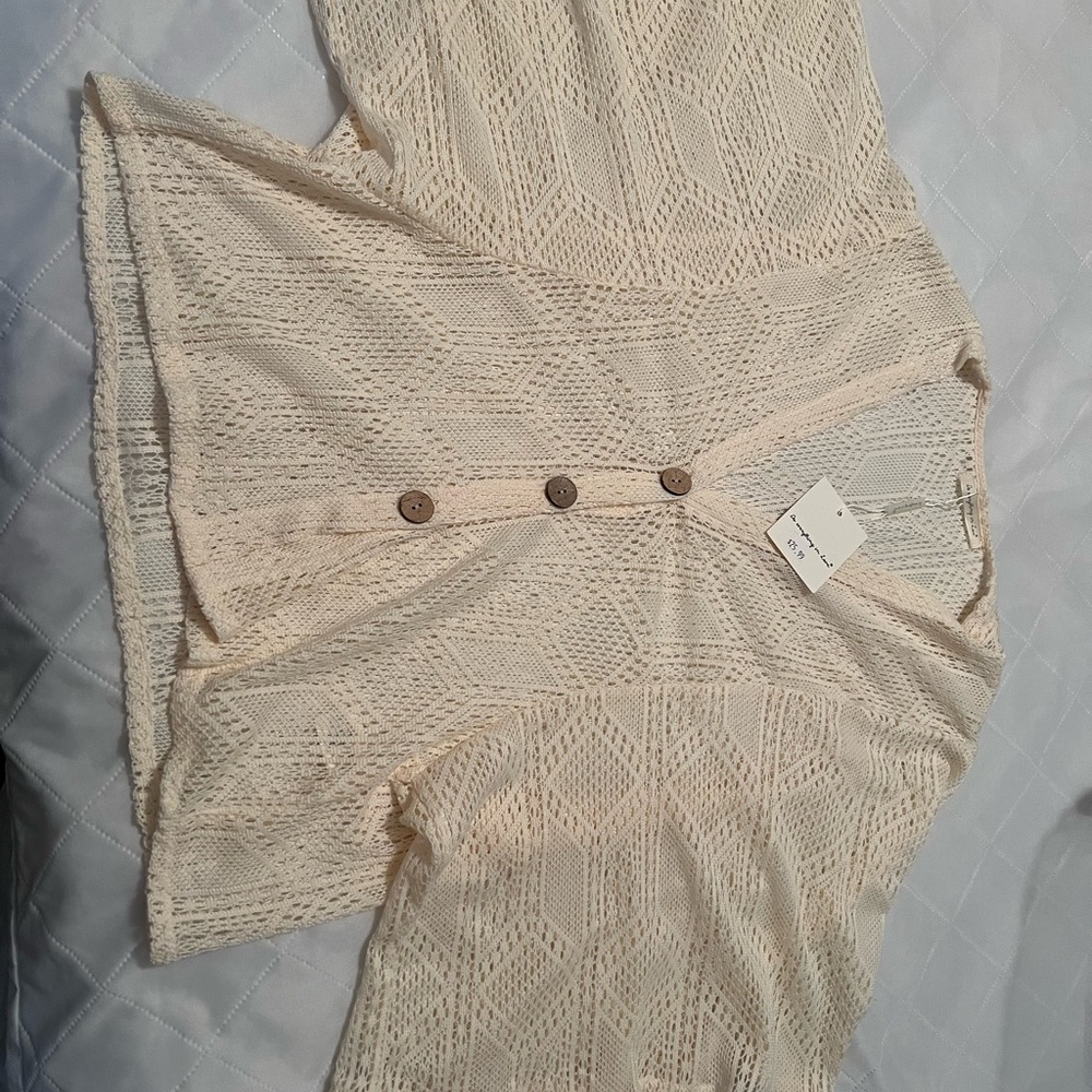 Cream hollow out pattern top